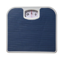 Modern scales on white background